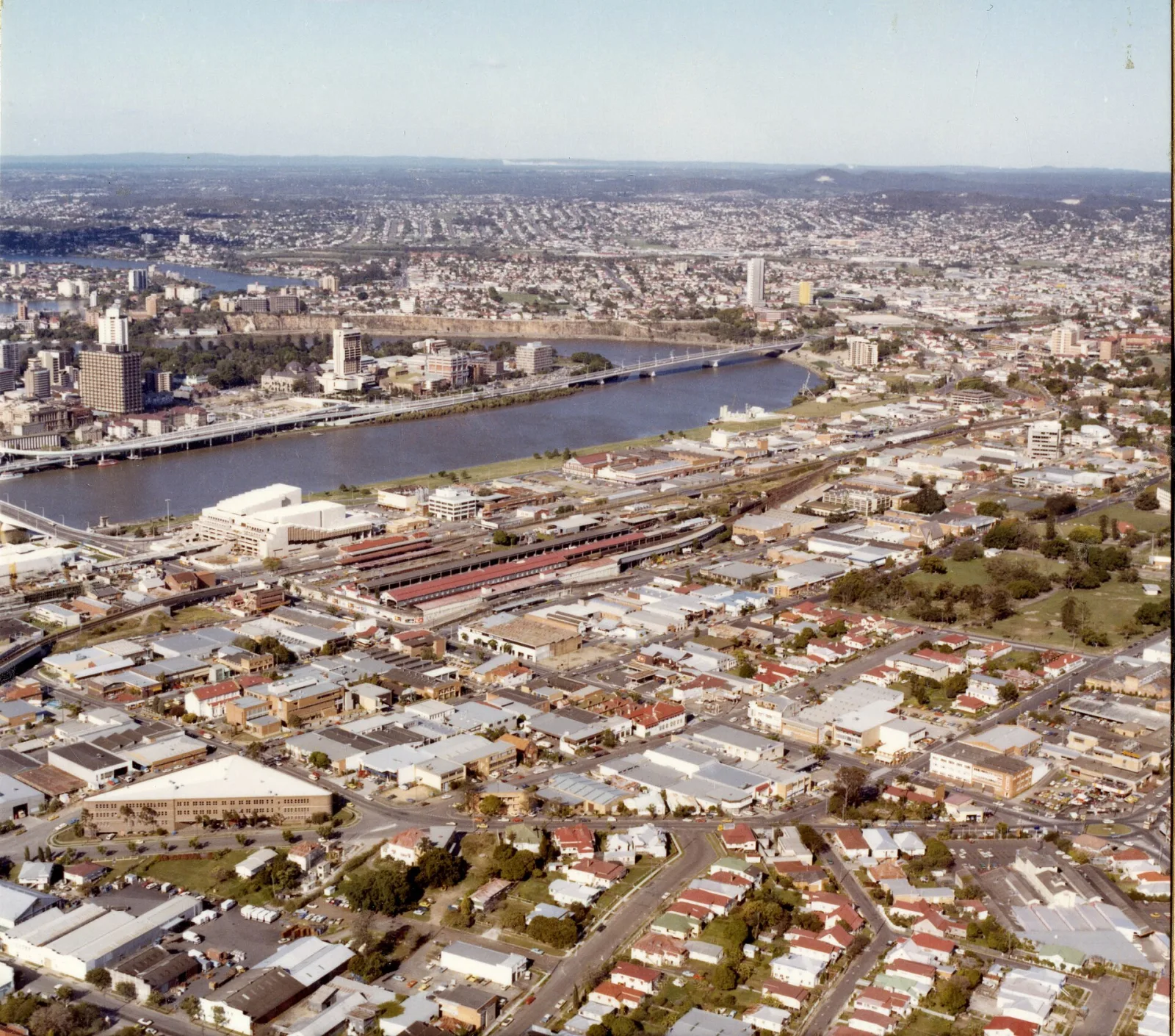 South Brisbane from the air, 1983. Visible are South Brisbane railway station, Musgrave Park. Across the Brisbane River is the Brisbane CBD. Queensland State Archives Item ID3014596, Aerial photographs